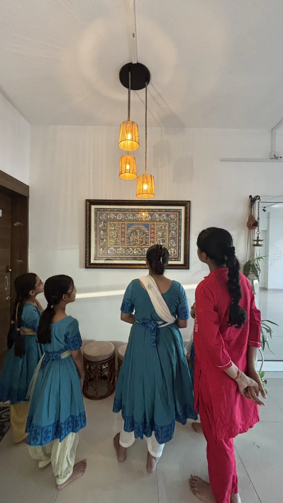 Young students in their Indīvarā Arts practice uniforms