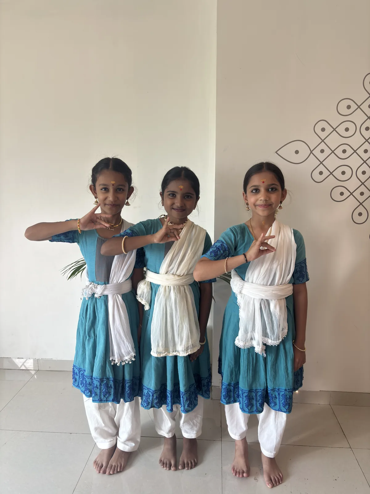 Young students of Indīvarā Arts in practice uniforms