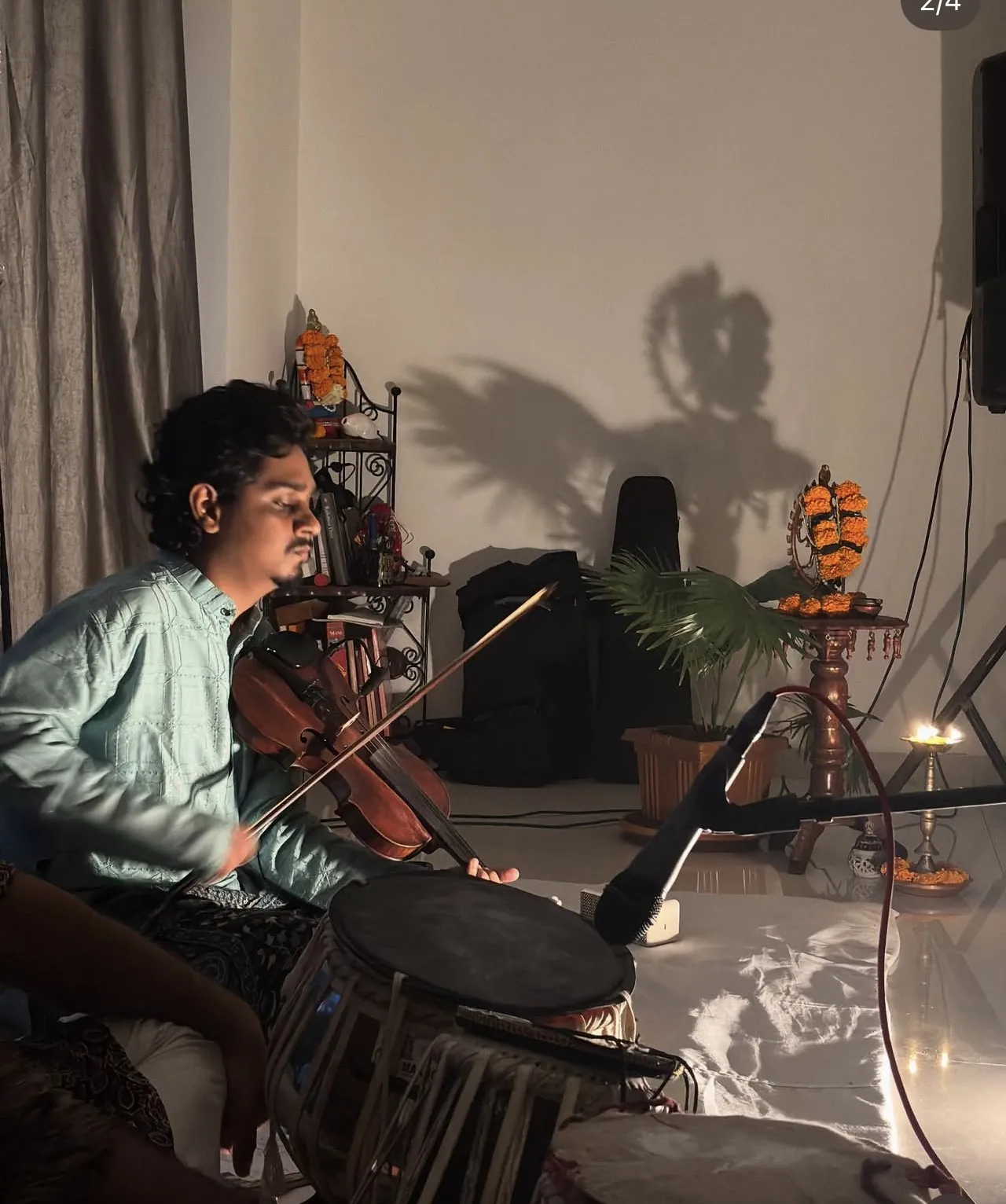 Violin and mridangam accompanying a recital at Indīvarā Arts